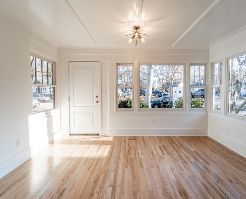 Boise Sunroom Remodel Light Fixture Windows Wood Flooring by Home Remodeling Boise, Garden City, Eagle, Meridian, Idaho | (208) 384-0591 | www.remodelboise.com