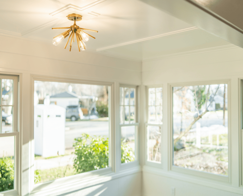 Boise Sunroom Remodel Light Fixture Windows Wood Flooring by Home Remodeling Boise, Garden City, Eagle, Meridian, Idaho | (208) 384-0591 | www.remodelboise.com