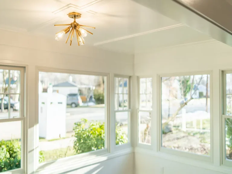 Boise Sunroom Remodel Light Fixture Windows Wood Flooring